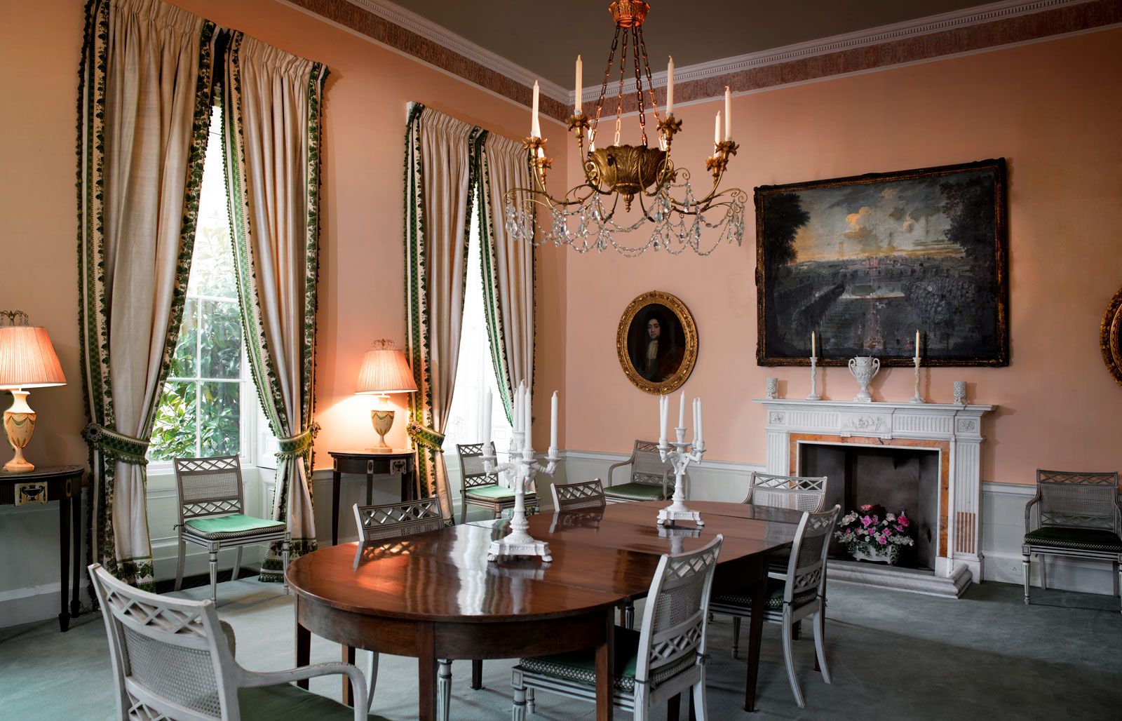 Image may contain Furniture Chair Room Indoors Dining Room Living Room Interior Design Flooring Wood and Lamp