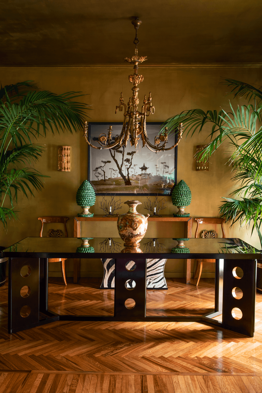 Image may contain Wood Hardwood Flooring Furniture Table Dining Table Living Room Room Indoors Chair and Lighting