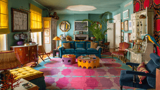 Image may contain Living Room Indoors Room Furniture Interior Design Couch Chair Lobby and Flooring