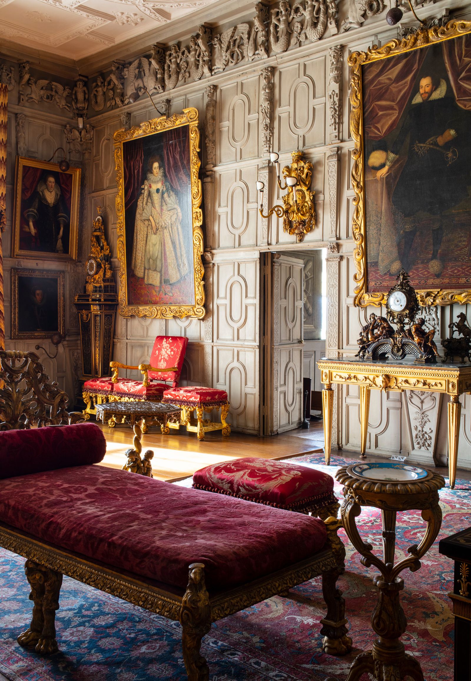 Gilt sconces by William Kent line the walls of the Ballroom at Knole once casting their flickering light over dancers...