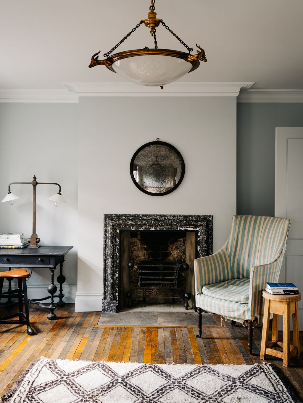The second bedroom with a bespoke chimneypiece in Peacock Eye marble.