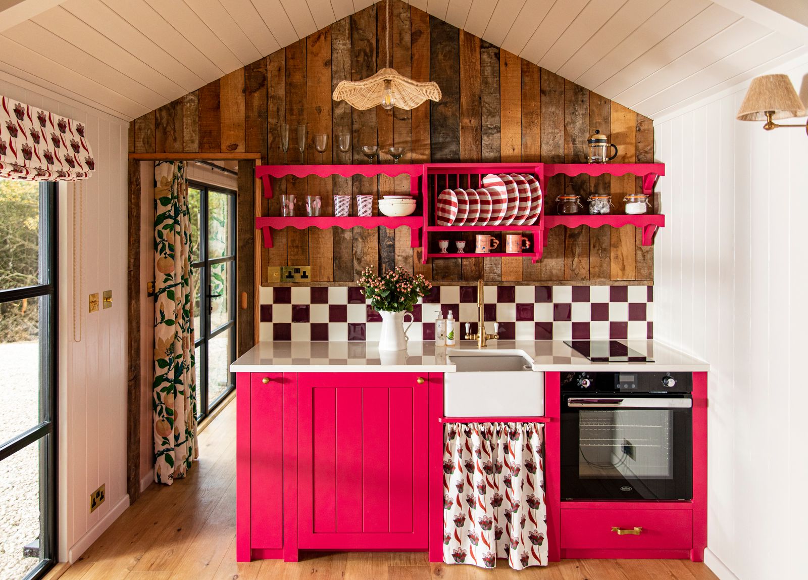 Aller Dorset's shepherd's huts feature bright colours and tonnes of pattern  take a look at this bright fuchsia kitchen
