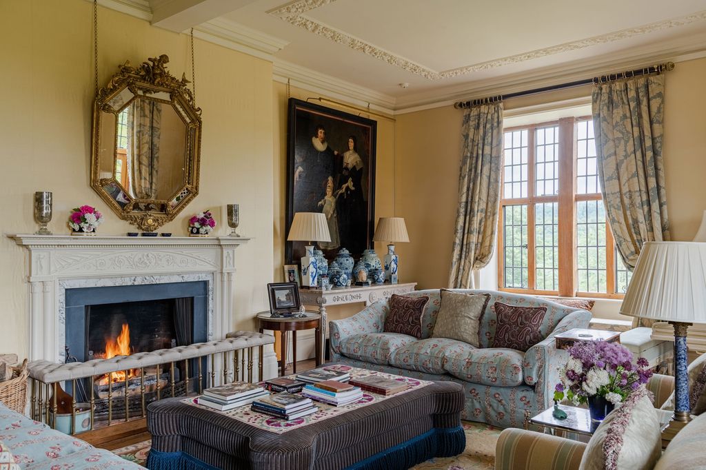 Hanging the walls with silk imparts a softness to this room that was created as part of the early twentiethcentury work.