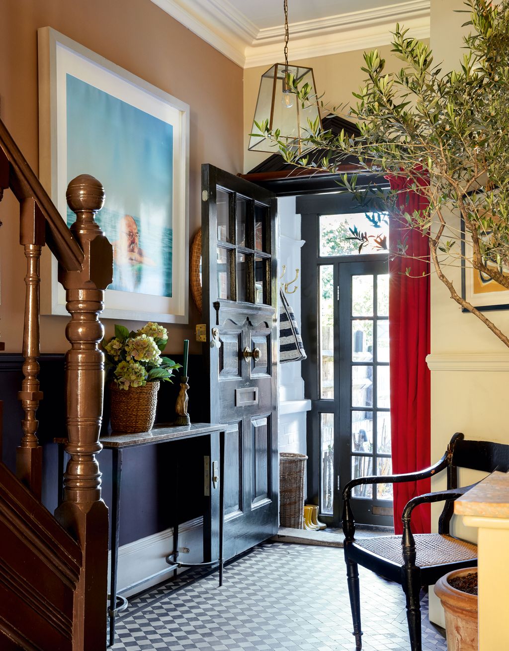 A laquered front door is a bold statement and the perfect entrance to stylist Sarah CorbettWinder's northwest London...