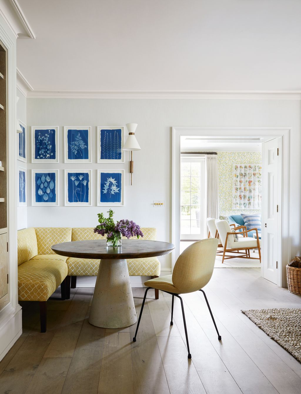 In one corner cyanotypes sourced by art consultant Rebecca Gordon are the backdrop to a seating area with a concrete and...