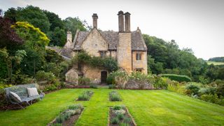 A 17thcentury house in a hilltop Cotswold hamlet remodelled in exquisite Arts  Crafts style