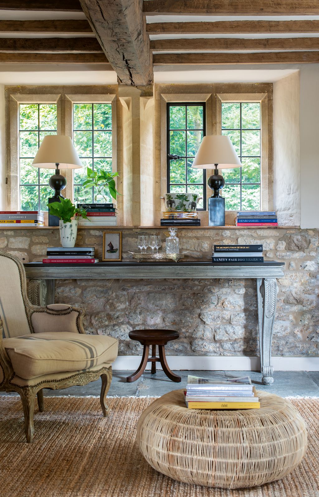 A Scottish console with a pair of Vaughan table lamps sitting above. The handmade mahogany miking stool was a wedding gift.
