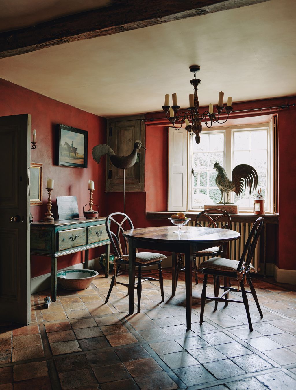 The French sheetmetal stylised cockerel weathervane c1840 sourced by Robert contrasts with a 19thcentury American...