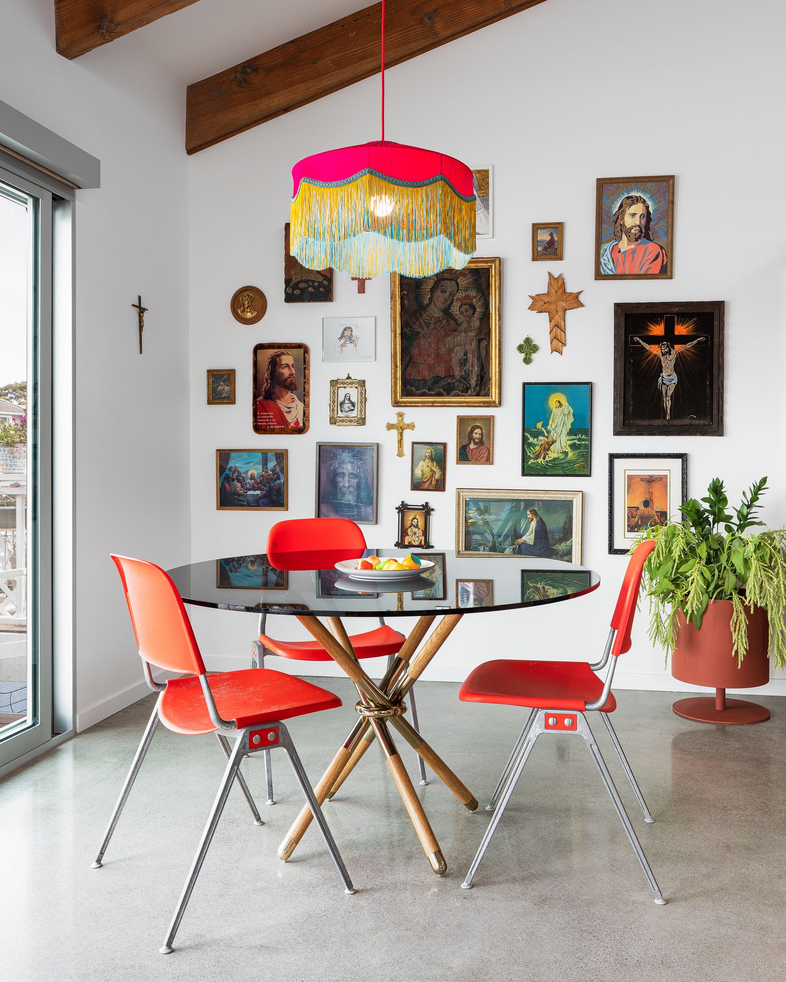 A client's collection of Jesusthemed art at a home in California designed by Nick Fyhrie.