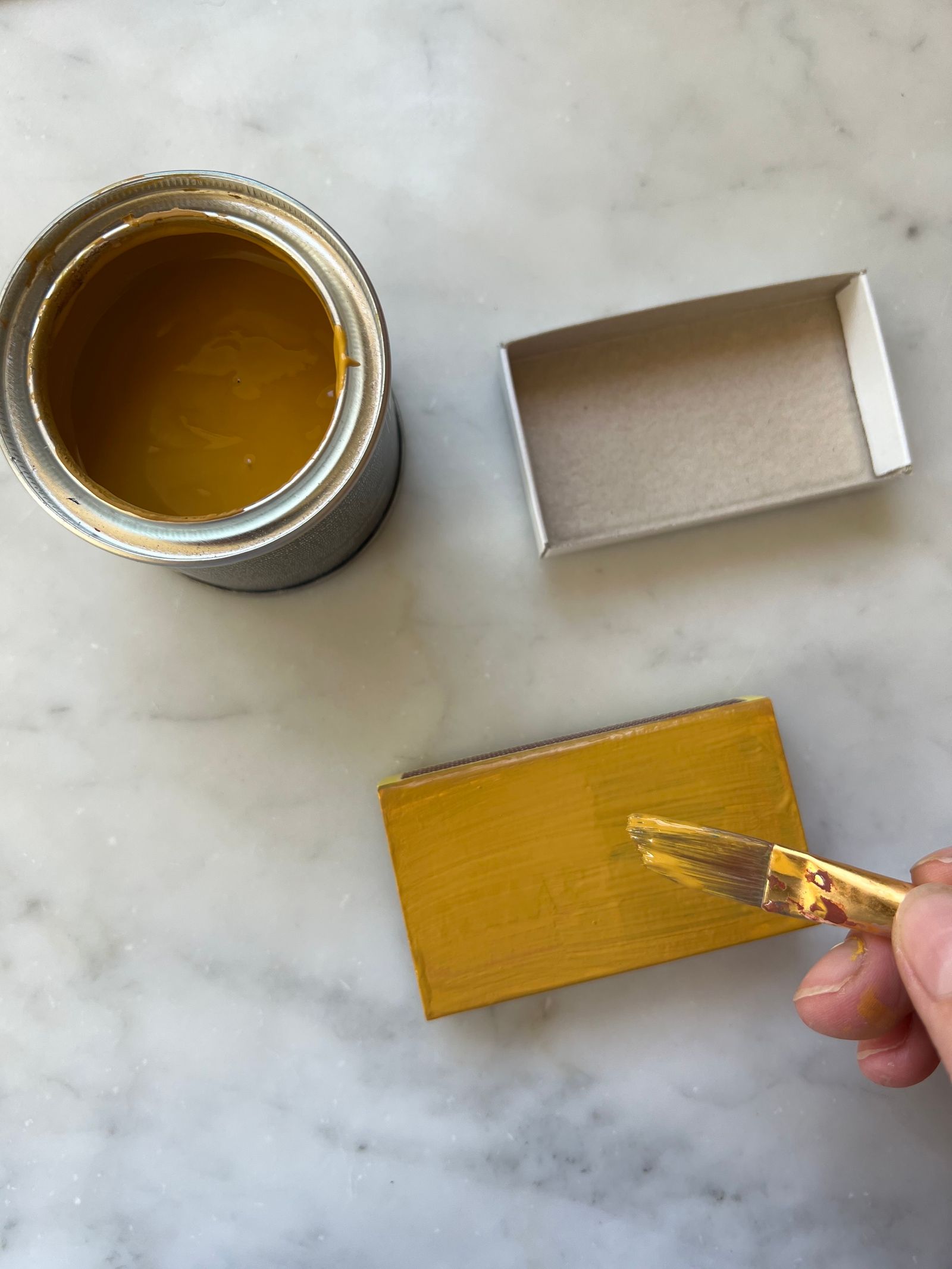 Start with a solid base of colour on each matchbox