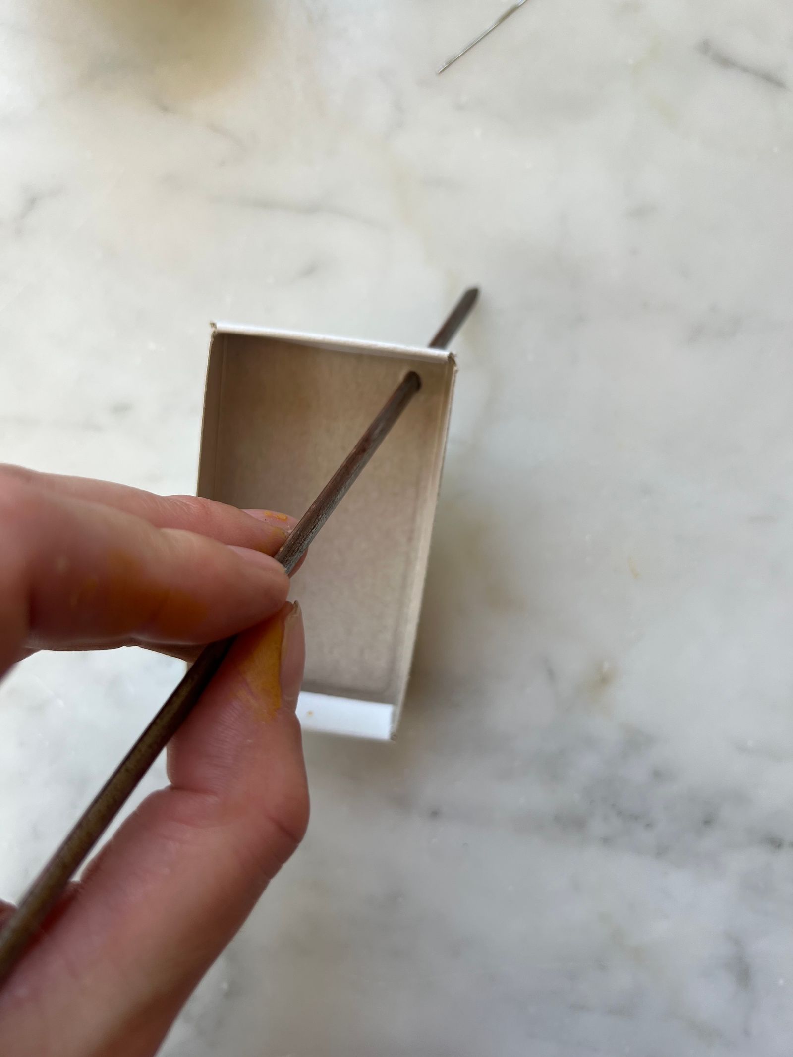 … and widen it with a skewer