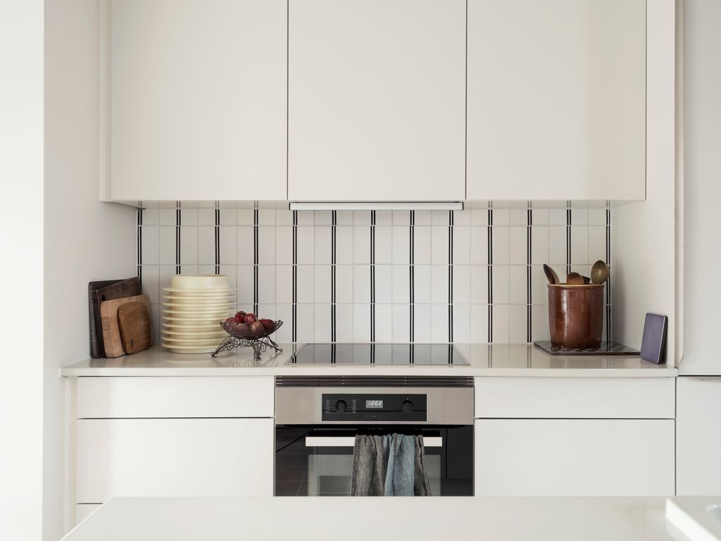 Rather than change the kitchen over entirely for a more subtle makeover Josephine added handpainted chromatic File Under...