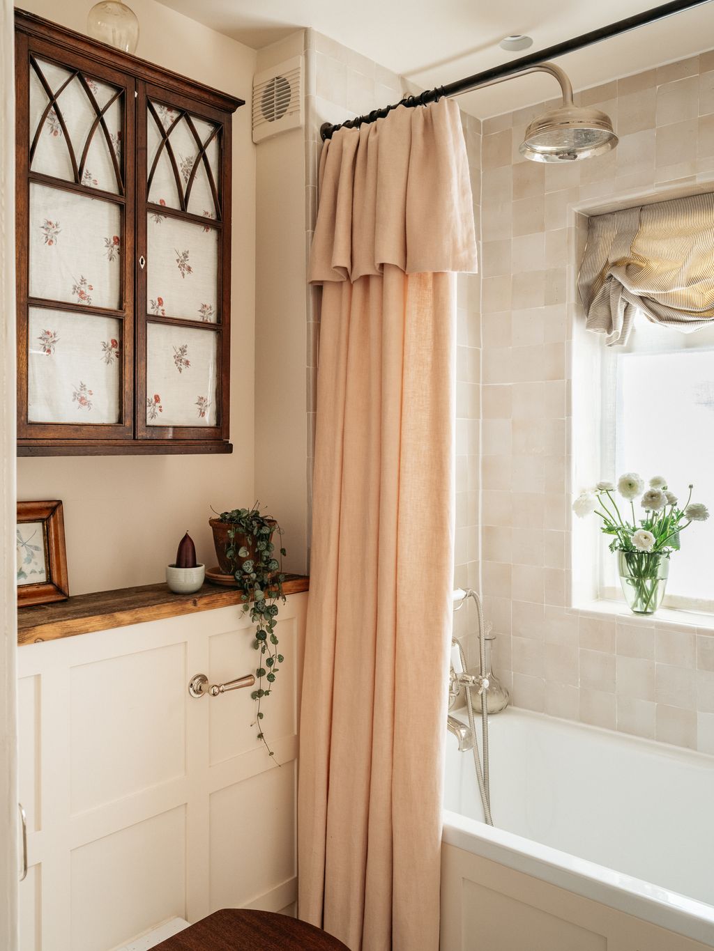 Charlotte meticulously planned the bathroom to make the most of the space. The shower curtain is made from Pierre Freys...