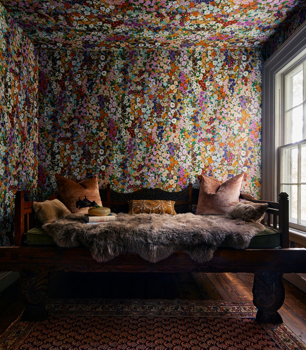 House of HackneysnbspHollyhocks wallpaper surrounds an annex off one of the bedrooms. The colourful print reminded...