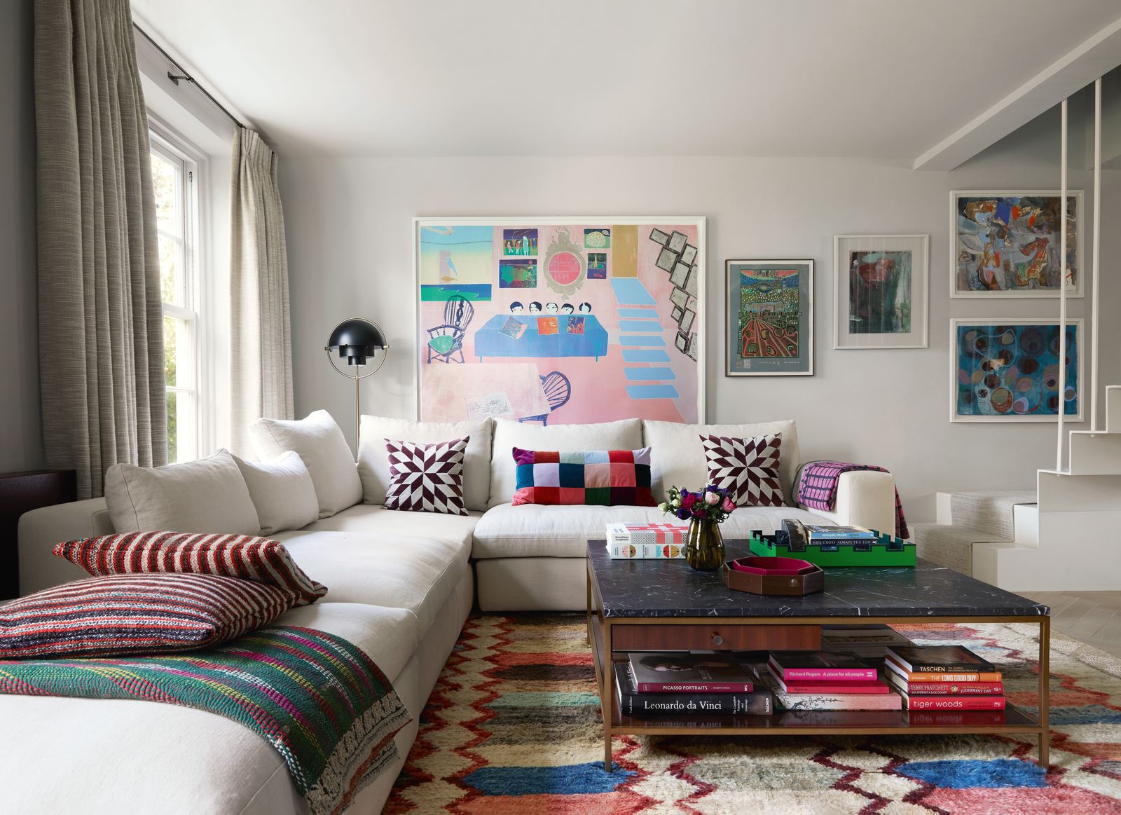 Walls in ‘Slate IV by Paint amp Paper Library used throughout provide a calm backdrop for artwork including Tom Hammicks...