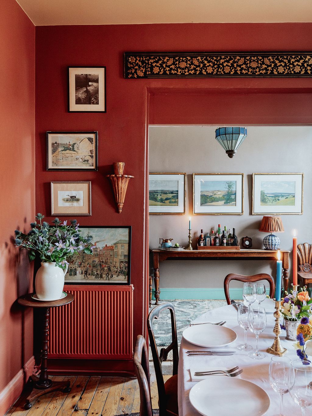 Walls in Paint Paper Librarys rich red ‘Masai give the pubs private dining room the feel of ‘a proper old school and...