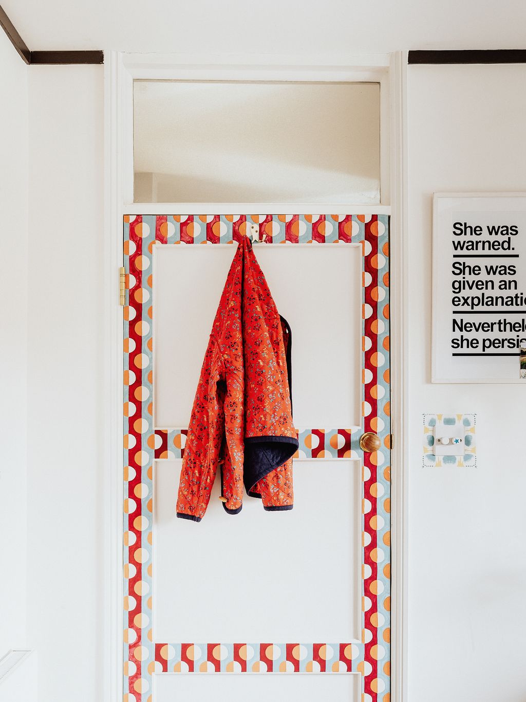 Freya a fineart student painted a striking border on the back of her bedroom door.