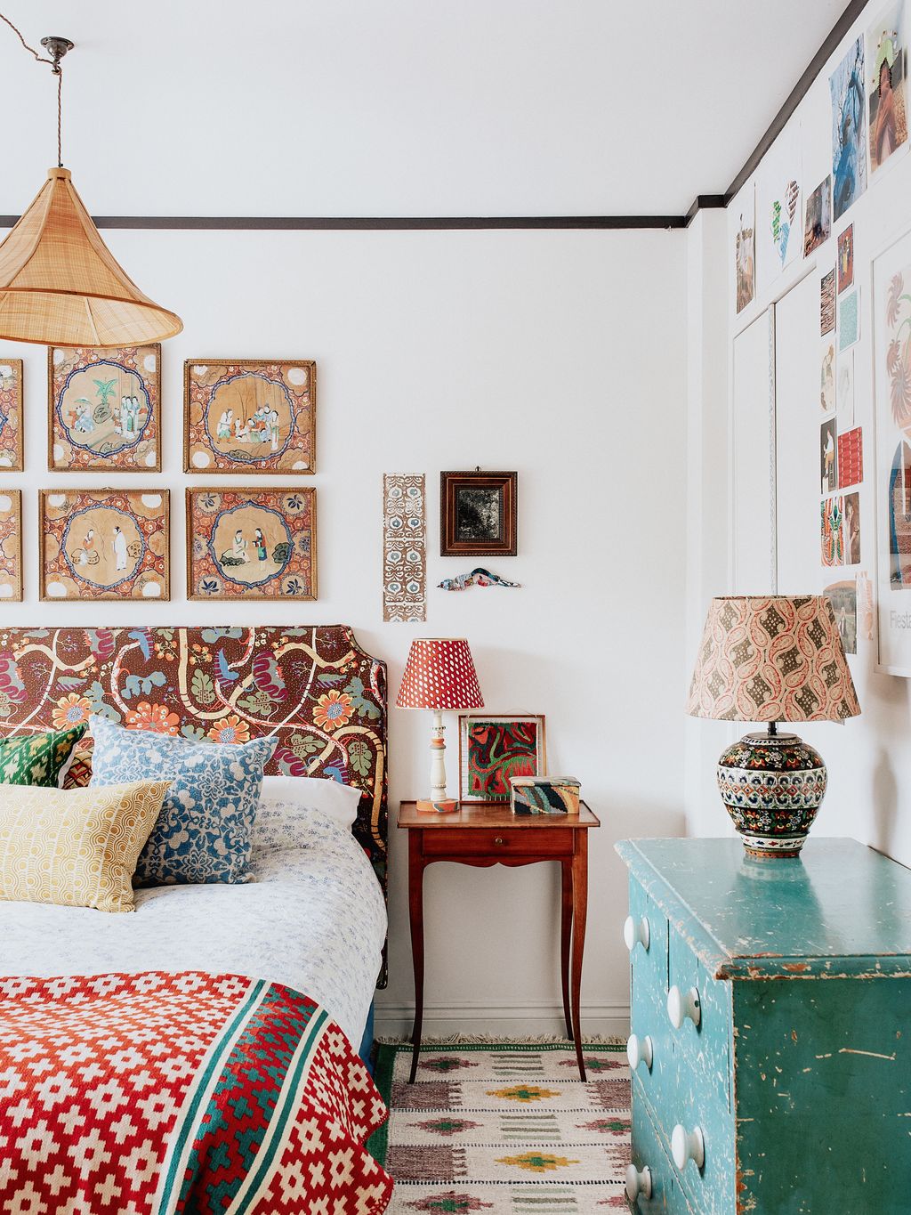 On daughter Freyas bedside table is one of the handpainted lamps she sells through her company Black Lion Workshops.