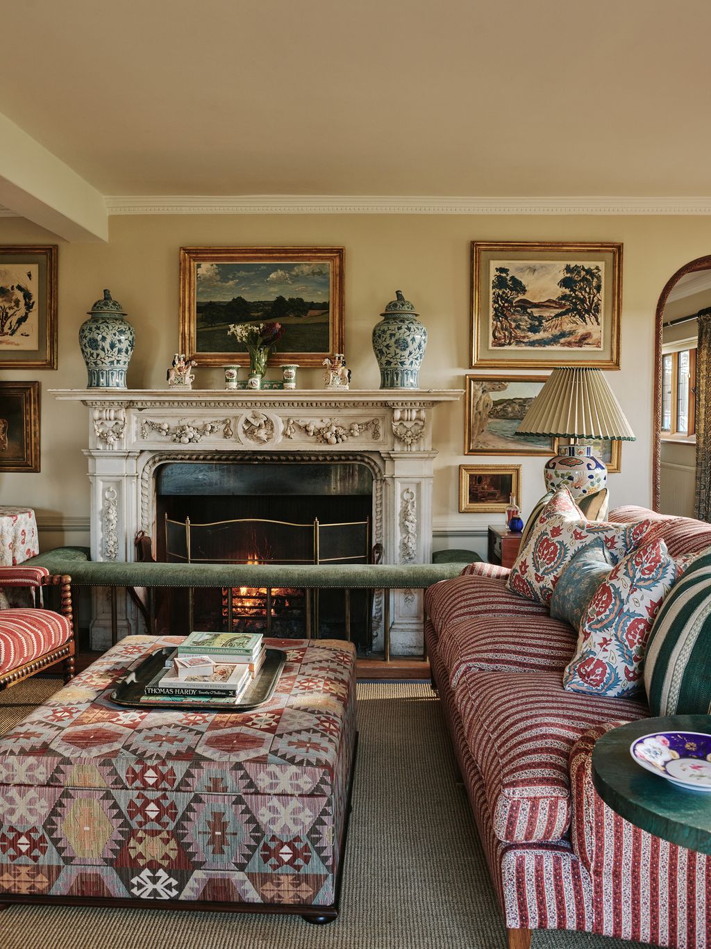 Surrounding the fireplace is a Westenholz reproduction club fender.