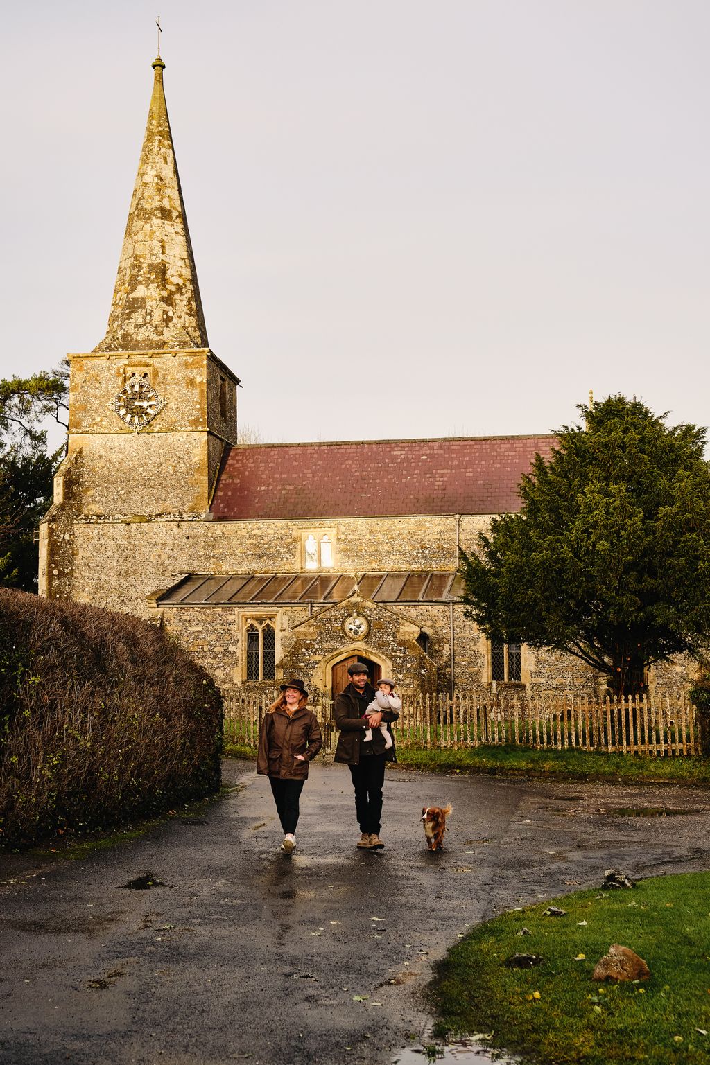 On a walk with Bailey and daughter Phoebe by the local village church.