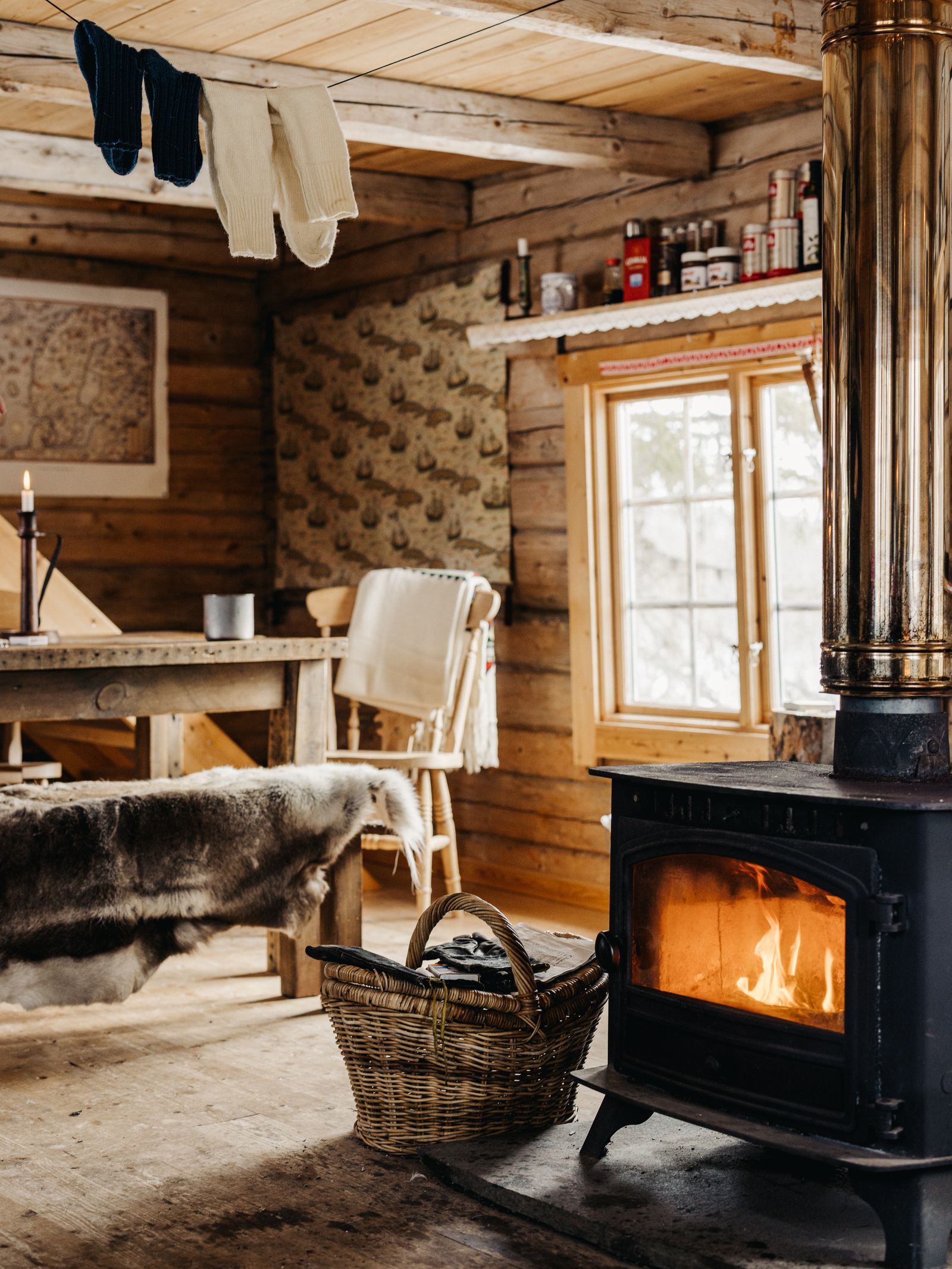 A corner of the dining area. Olly and Lisa bring all of their provisions out with them either on foot or by snowmobile.