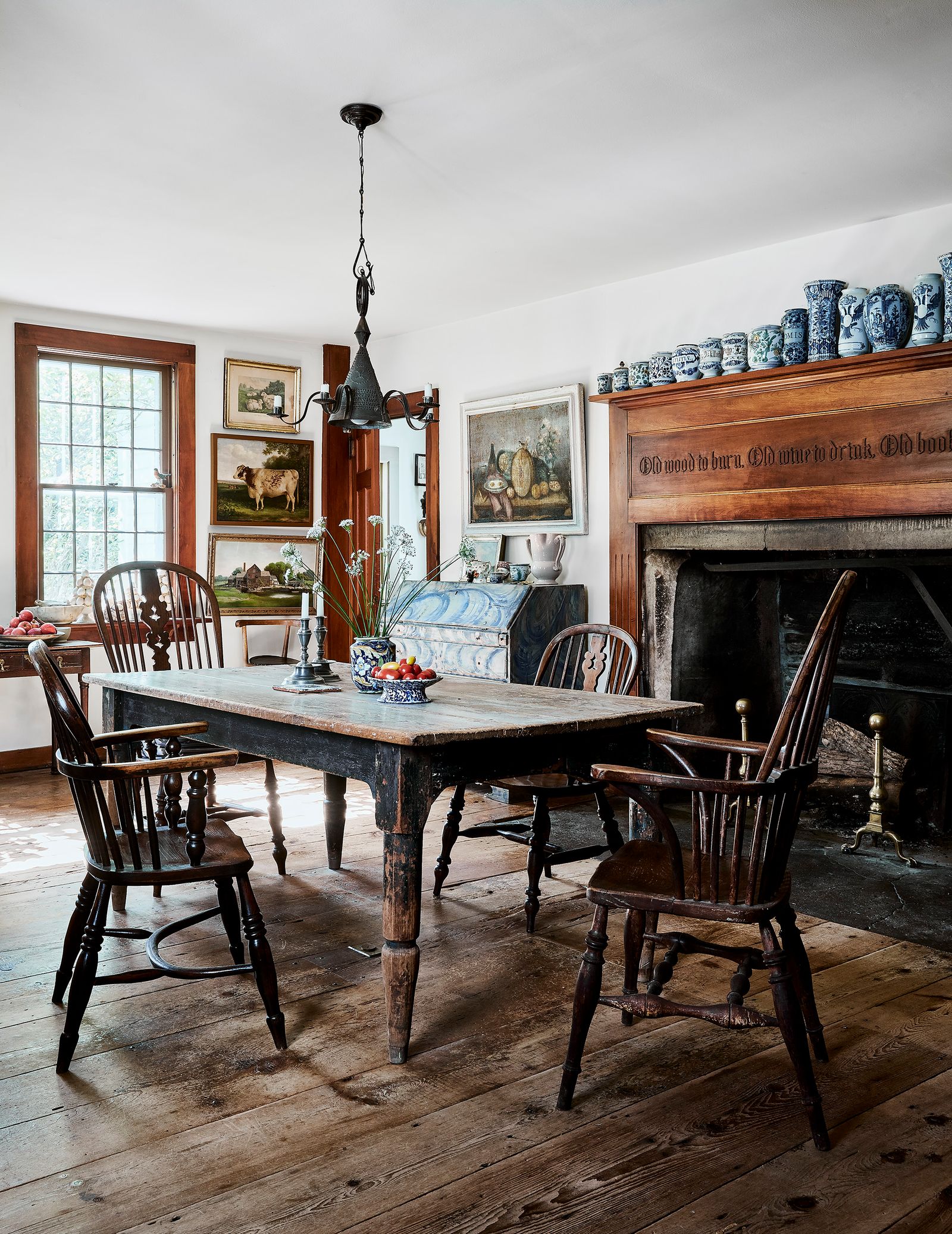 An oversized original hearth and an early 20thcentury mantelpiece are the heart of the kitchen and boast a collection of...