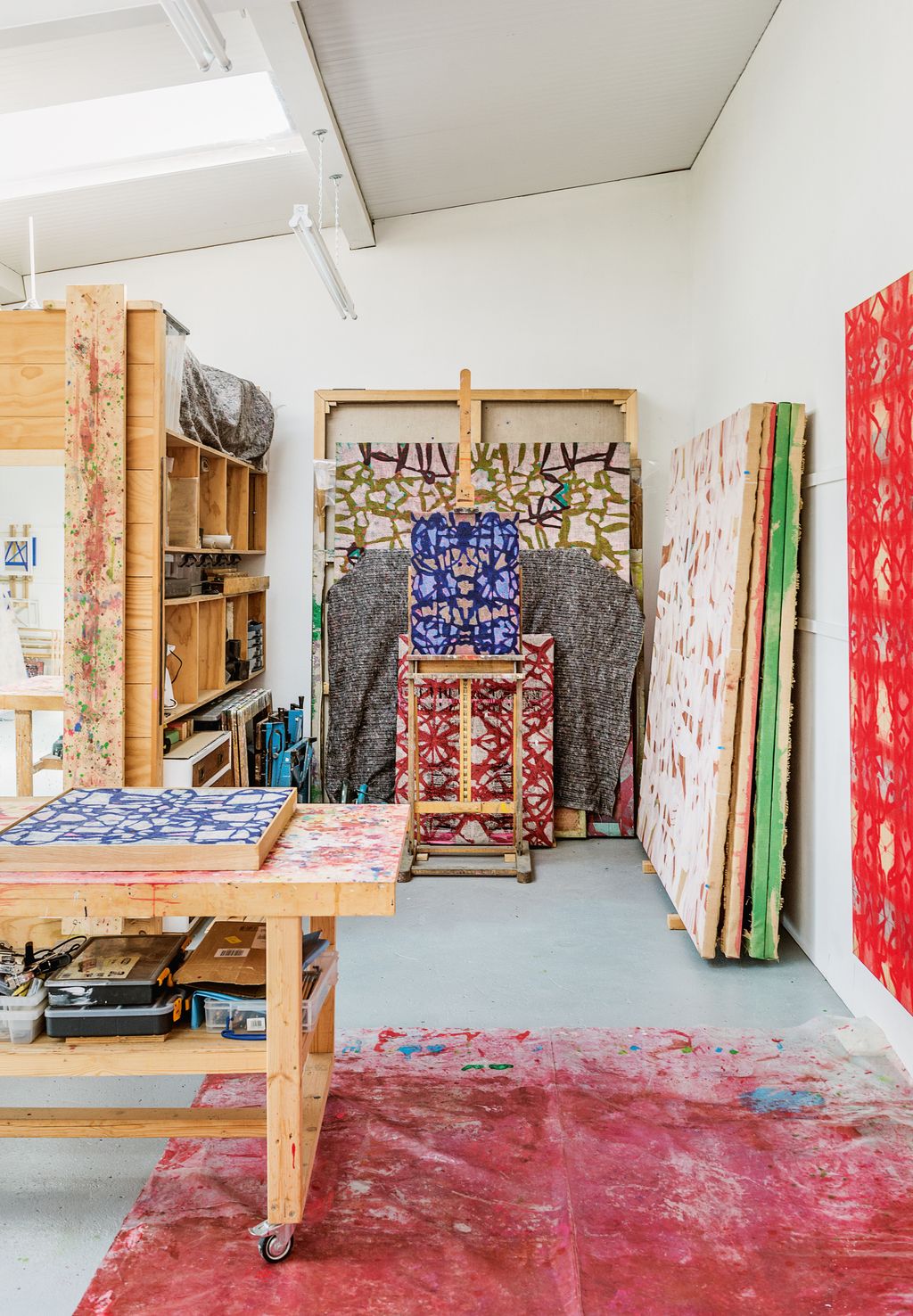 Lineament XIII  acrylic on burlap stands on the easel in the artists workspace.