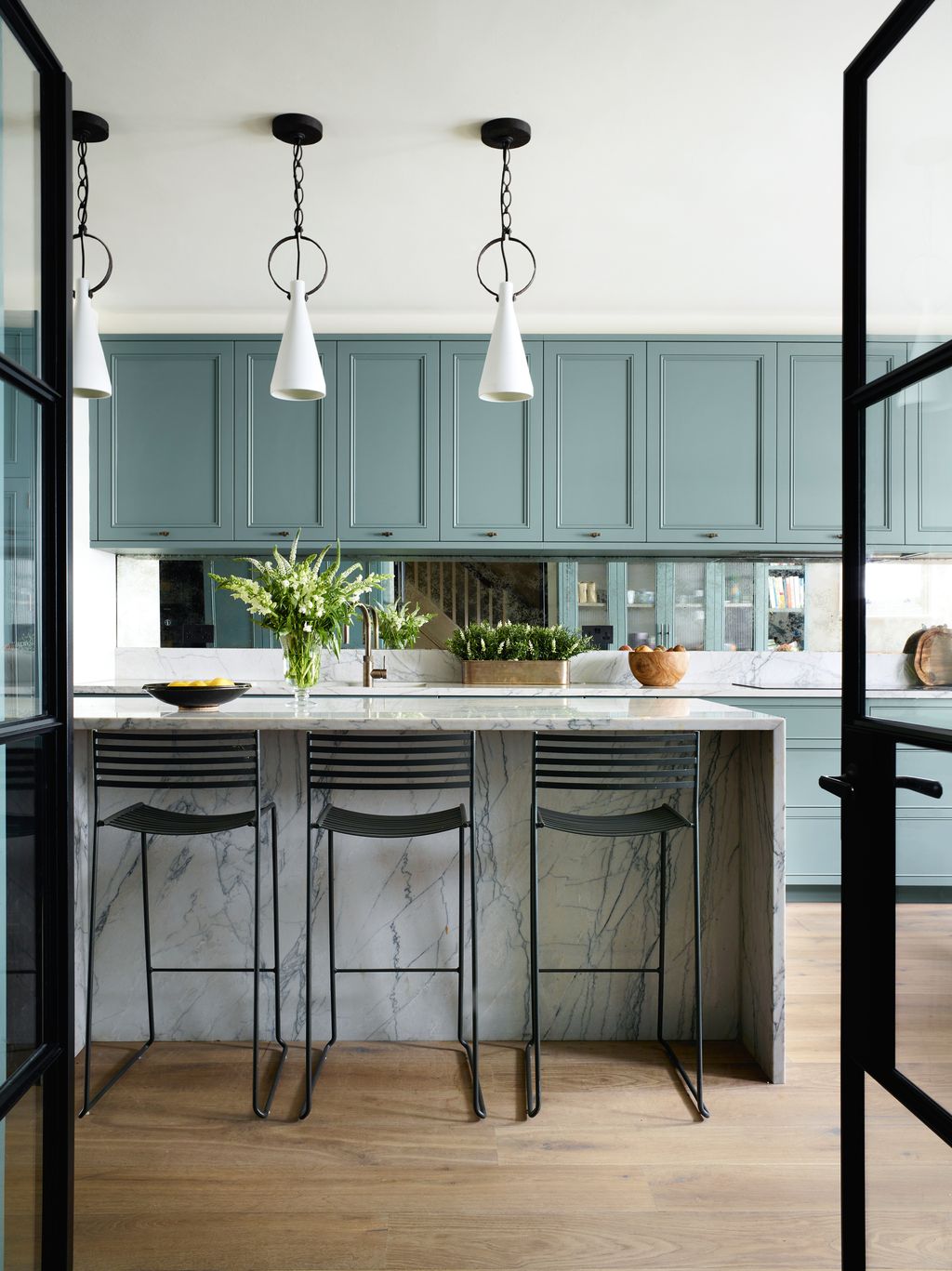 Designed by Chantel Elshout the kitchen has cabinetry in Little Greene Paint  Papers ‘Livid. ‘Limoges pendants from...