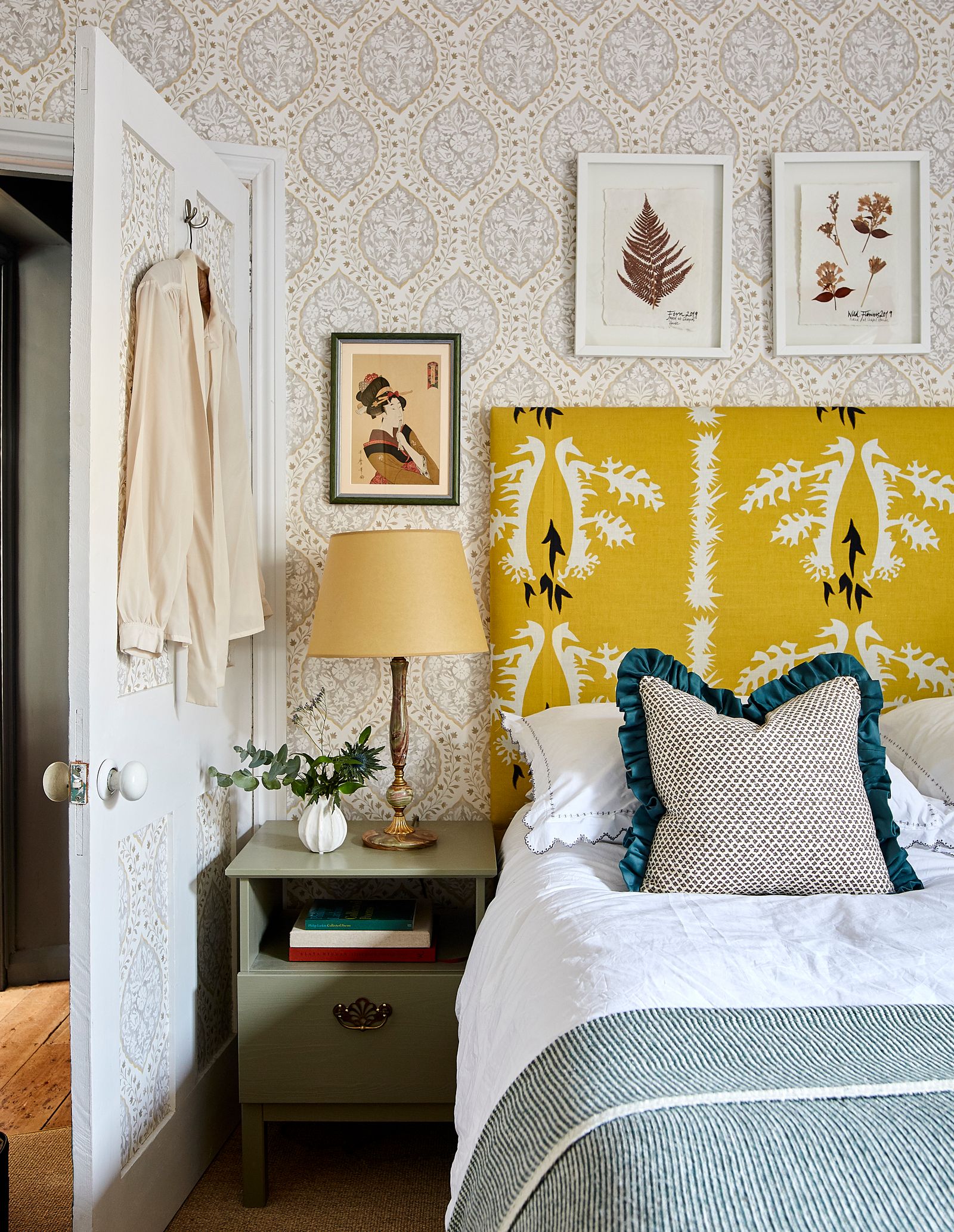 The bedside tables are Ikea's Ivar model painted in Farrow amp Ball's Treron. The bed cover is from Secret Linen Store...