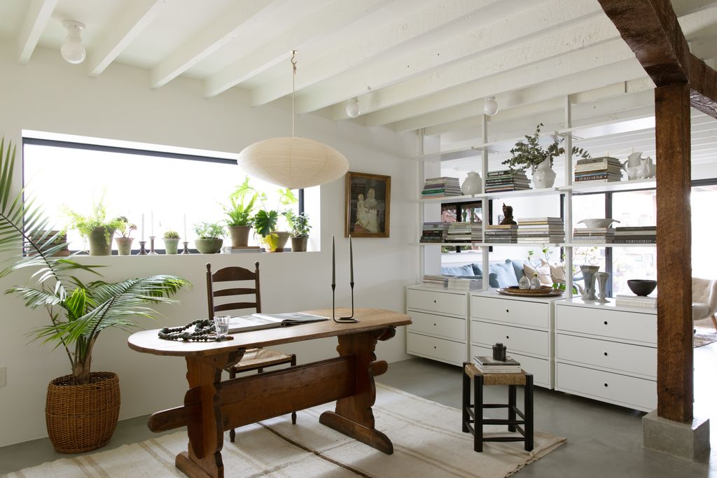 The lightfilled office features an antique trestle desk sourced from Sonoma County's beloved Chelsea Antiques. The chair...