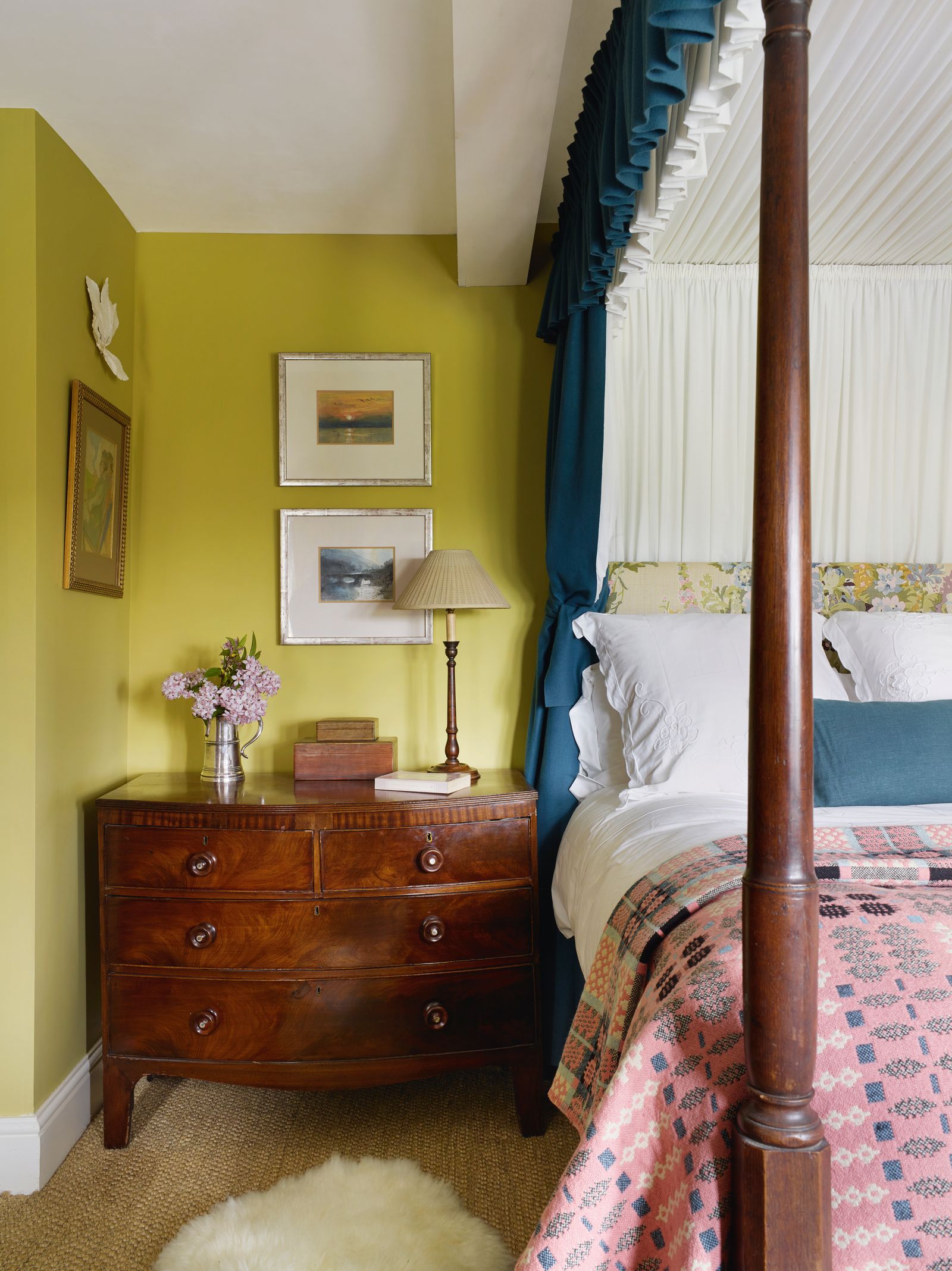 Set against walls in ‘Kelp by Fenwick amp Tilbrook the fourposter is brightened by a headboard in Jean Monros ‘Apperley...