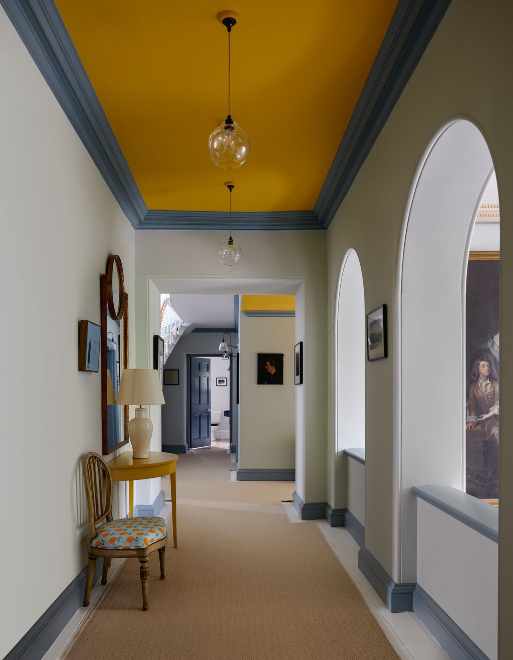 Painting the ceiling in a strong shade  in this case ‘Babouche by Farrow  Ball  makes an impact in this hallway designed...