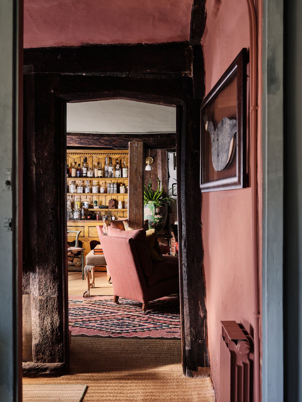 I painted the entrance hall of my cottage in Edward Bulmer's Sang de Boeuf. It's a rich earthy red that sets a welcoming...