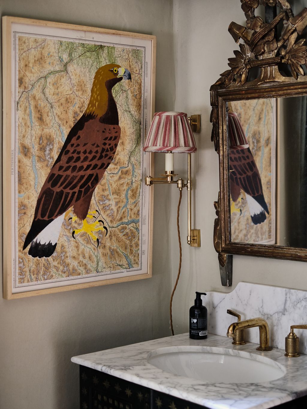 The Malmo vanity in the bathroom is made by Studio HÁM . An ‘Oban Rise and Fall wallnbsplight by Vaughan is fixed next...