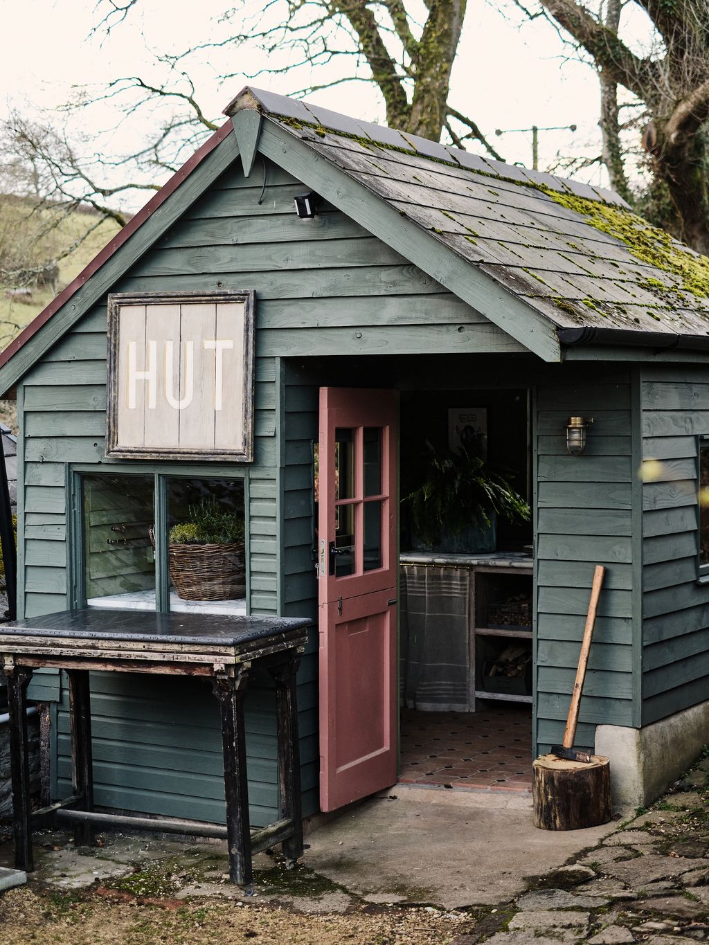 In interior designer Tom Cox's 17thcentury Devon house an outbuilding houses an additional kitchen in the garden for...