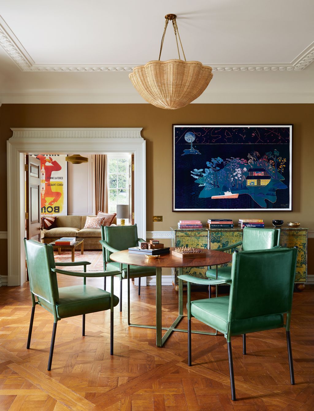 At the other end of the drawing room Soanes ‘Simplified Crillon chairs partner the card table and pick up on a lacquered...