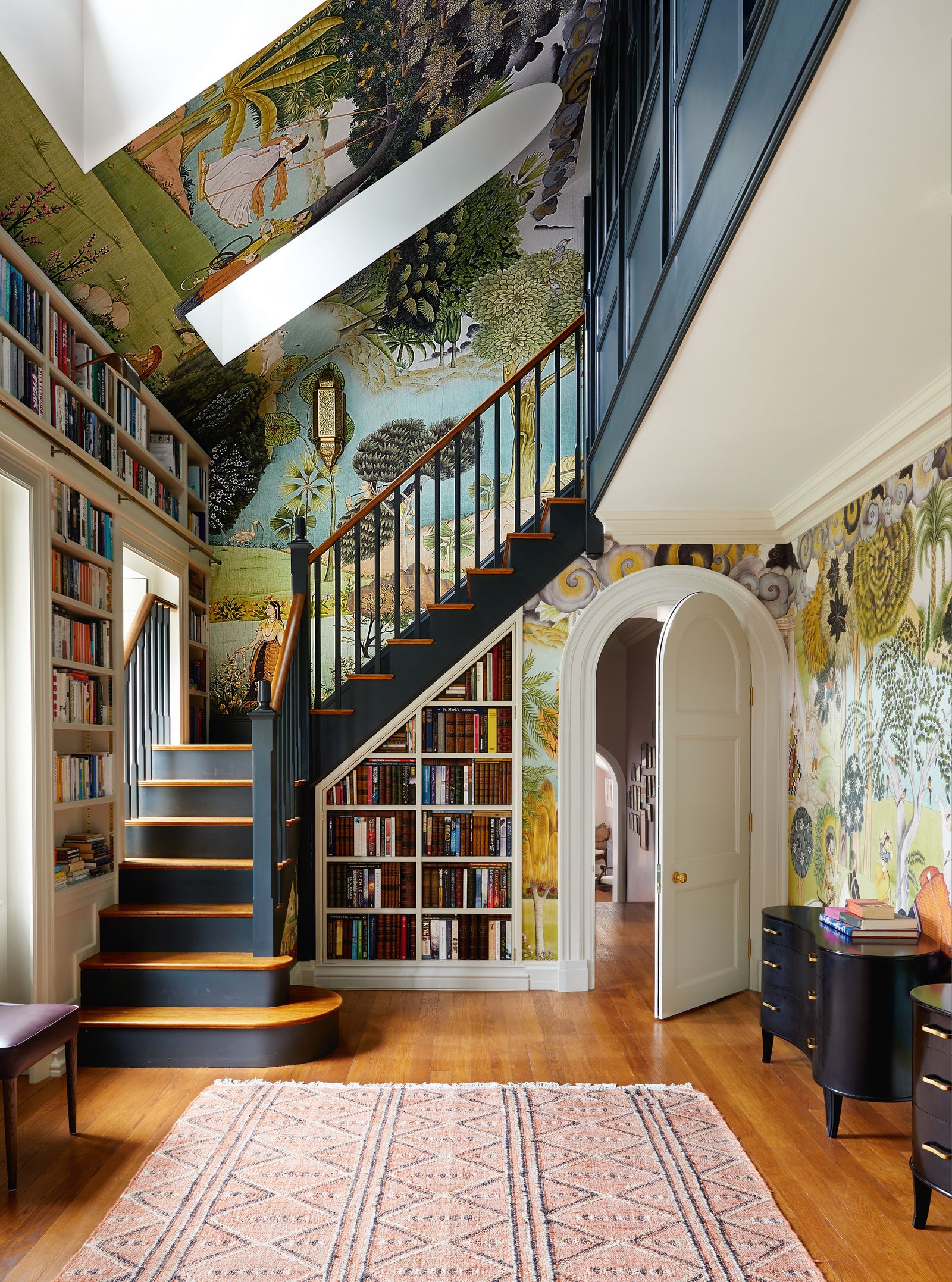 Iksel Decorative Arts ‘D Rajput Fantasy wallpaper provides a vibrant backdrop for the staircase in a country house by...