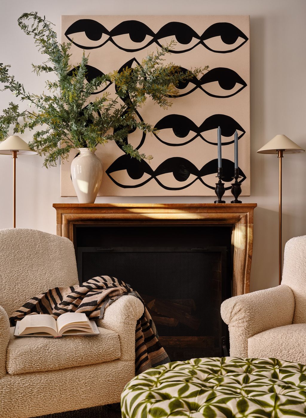 The mantel was a preexisting fixture in the apartment added by the apartment's previous owner. The artwork  which hangs...