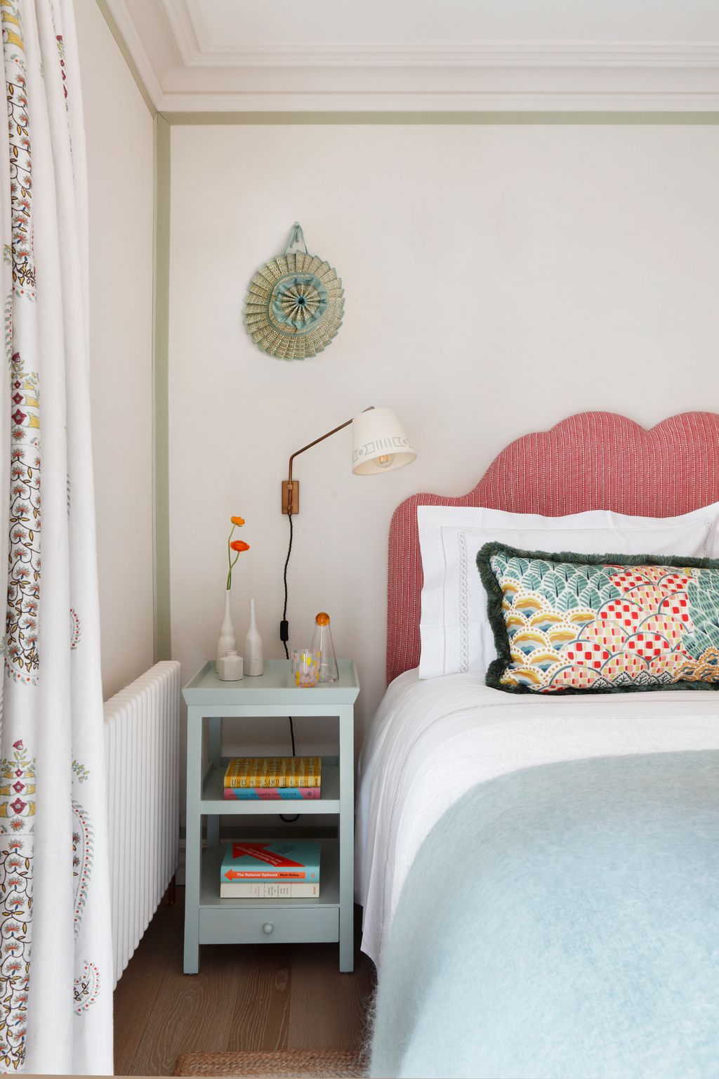 The bespoke headboard in the second bedroom in this Notting Hill piedàterre by Studio Peake is in Wicklewood on Rustic...