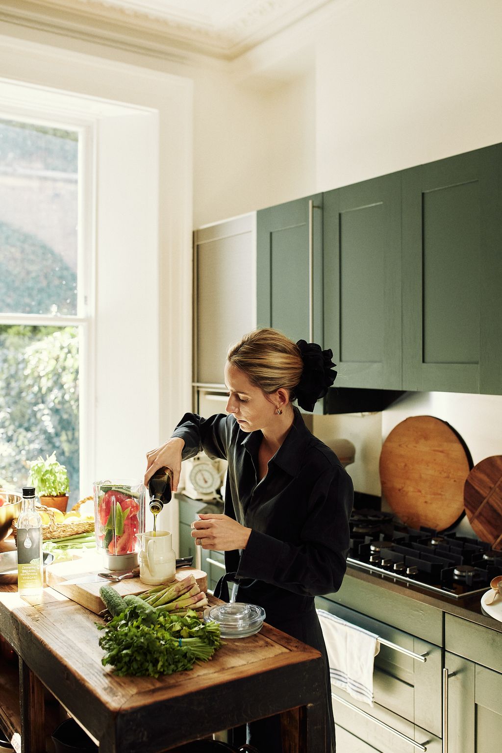 Juana preparing gazpacho.