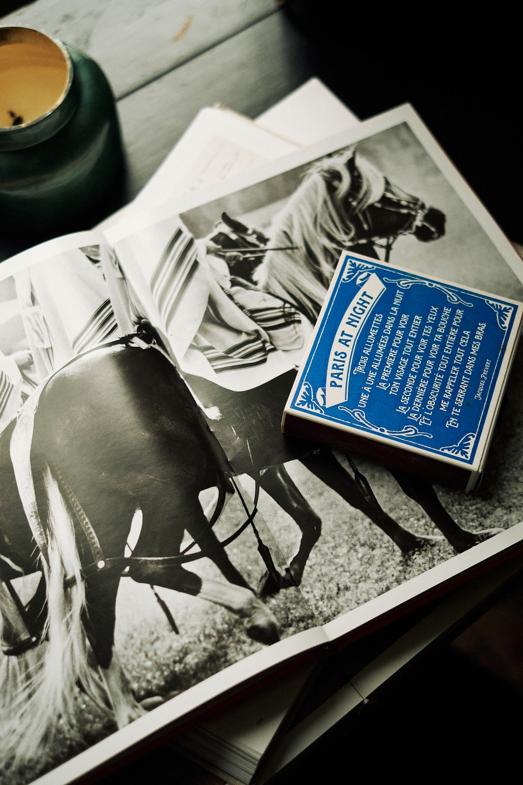 A detail shot of the desk top shows a Mario Testino book alongside ‘Fina Estampa matches that capture the world of...