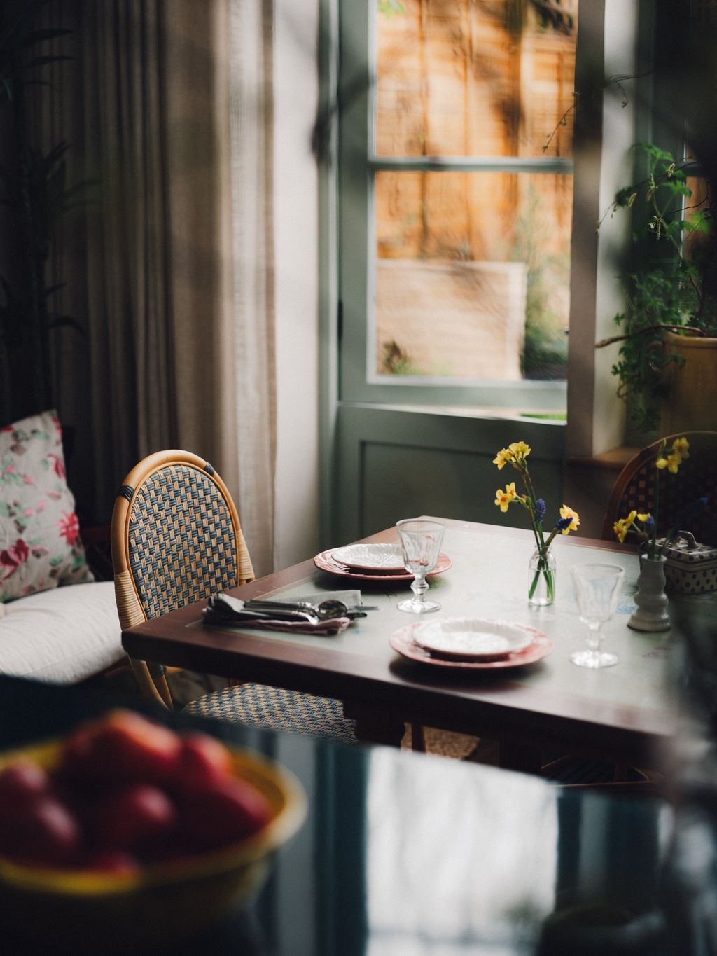 The rattan dining chairs are from Birdie Fortescue.