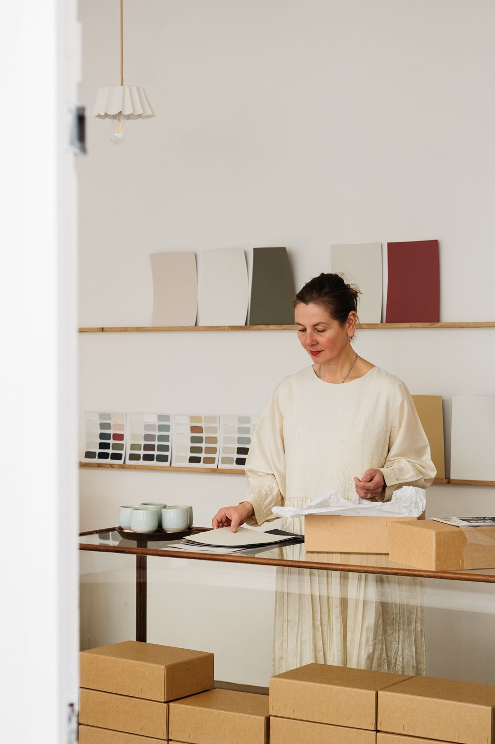 Cassandra Ellis founder of Atelier Ellis pictured in the Atelier Ellis townhouse on Walton Street. Walls painted in...