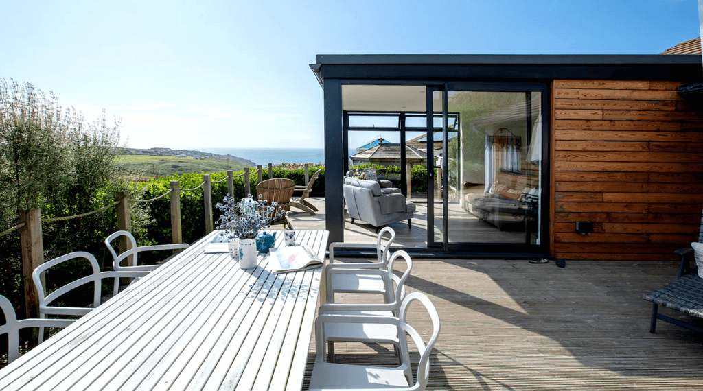 Surfer's paradise awaits at this modern house in Penzance. Atop a cliff overlooking a sparkling sea guests can enjoy sea...