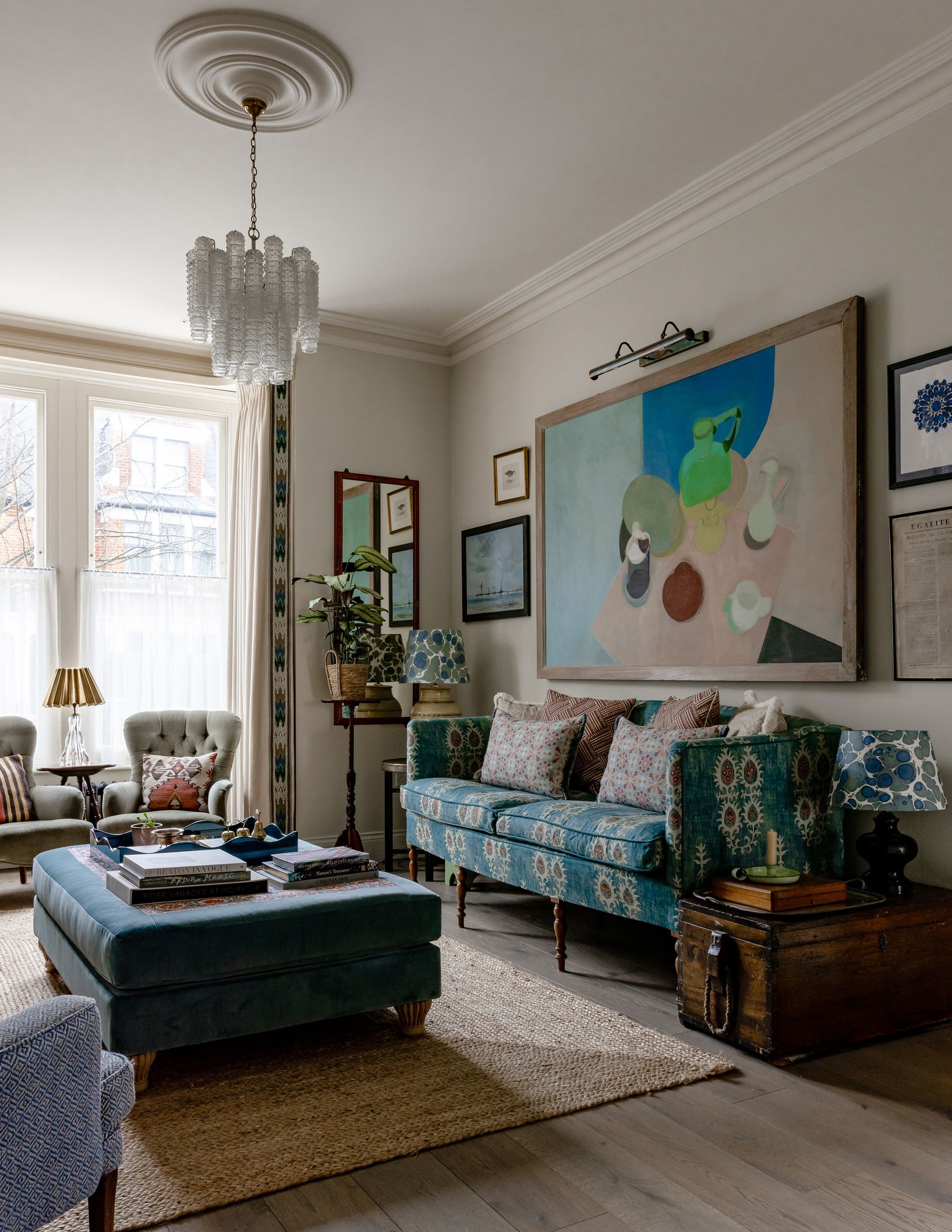 A layered sitting room in designer Polly Ashman's west London house.