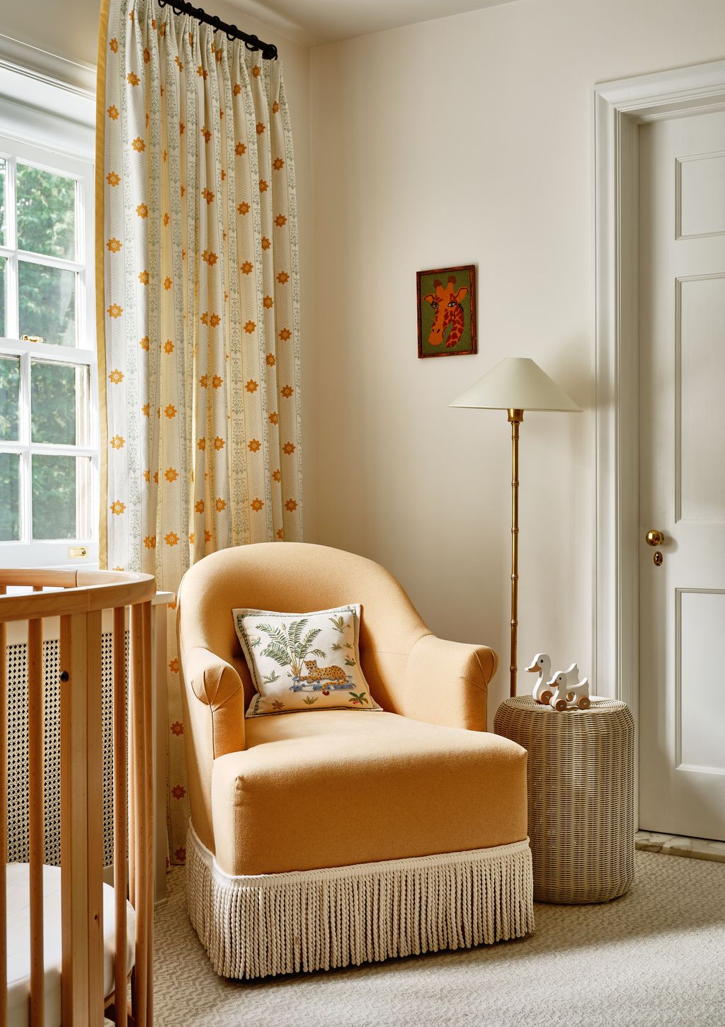 This sweet corner of the room is versatile with the potential to serve as a nursing area reading nook or place to curl...