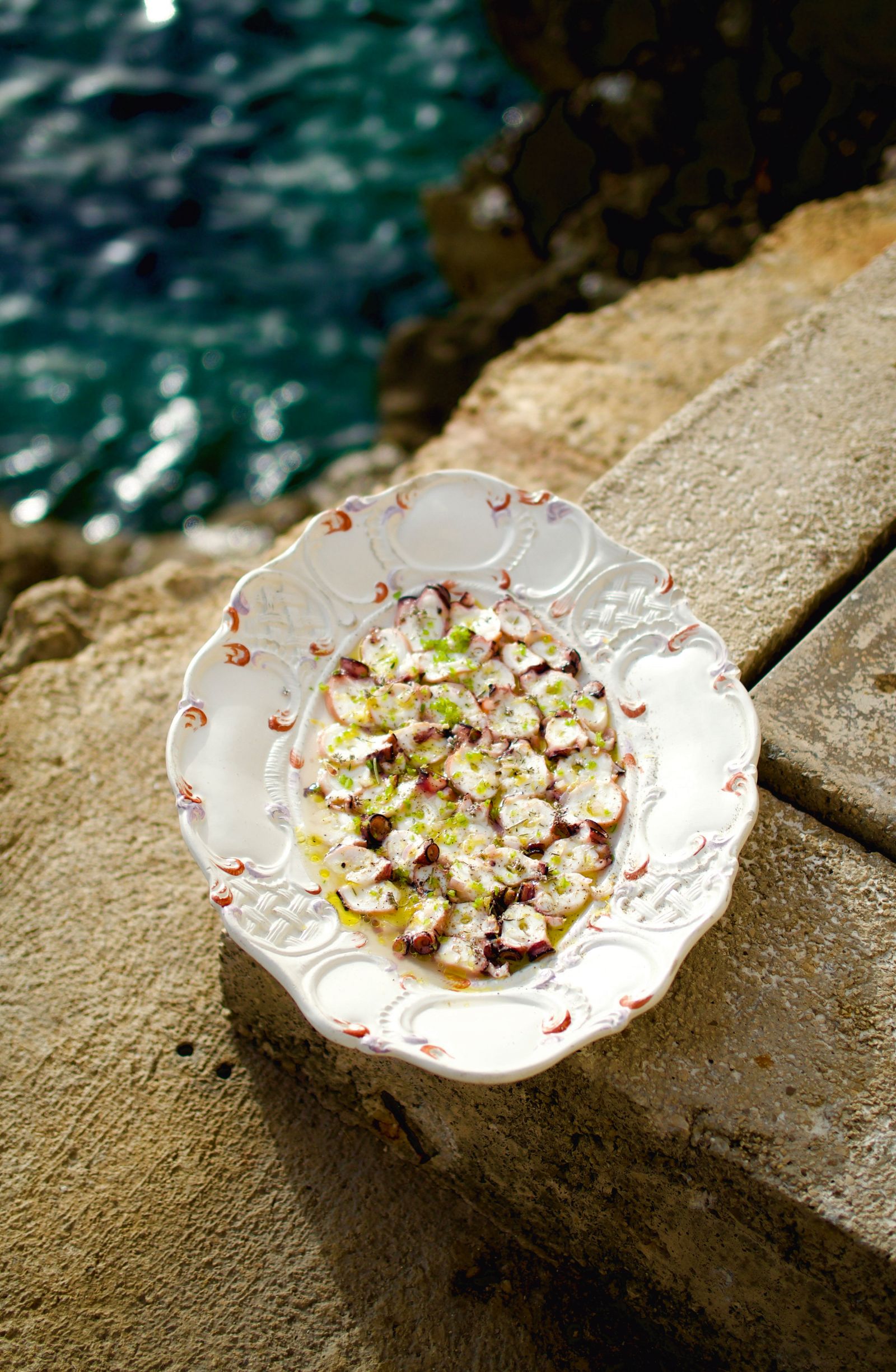 Delicious fresh octopus marinated in citrus and chilli served by chef Sylvain Roucayrol at Tubas restaurant.