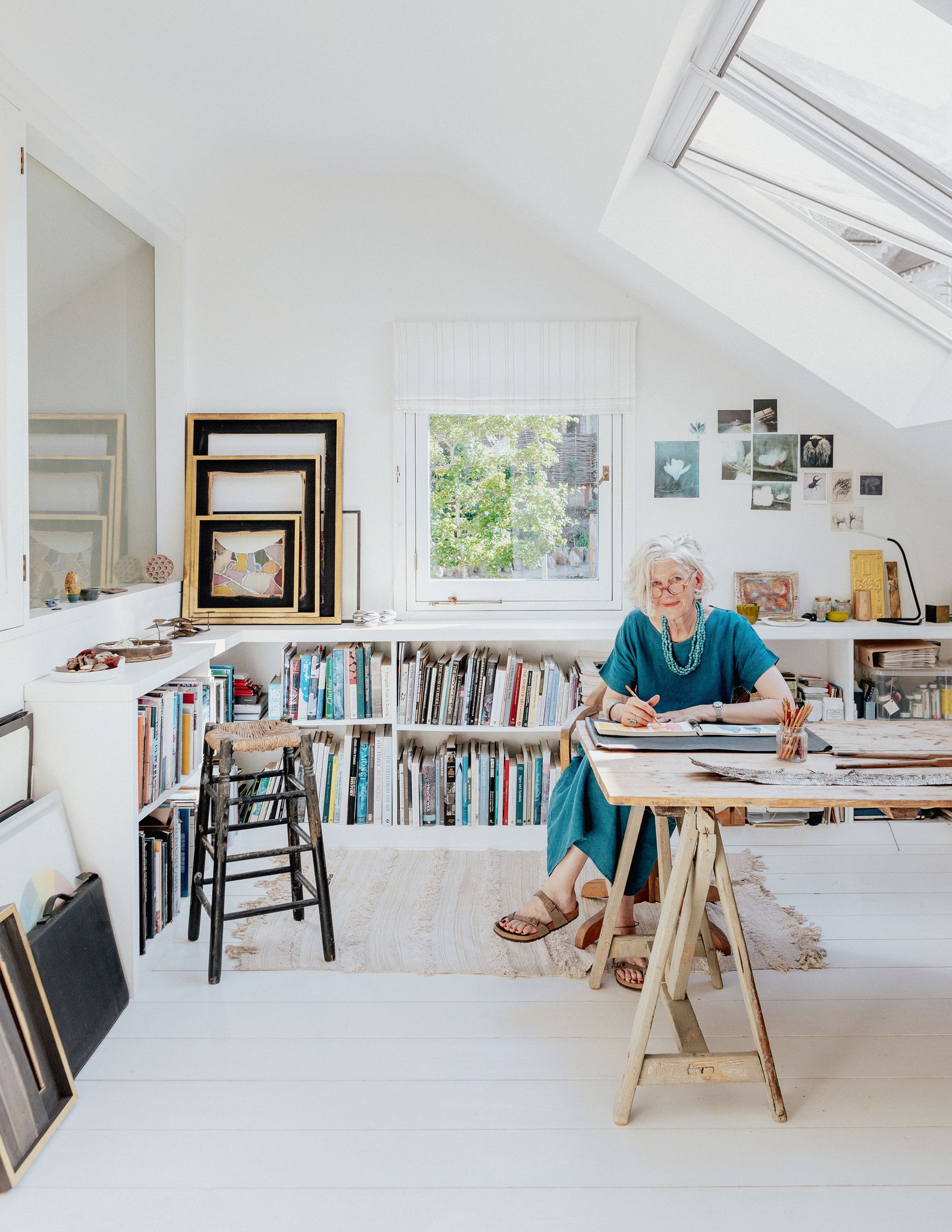 Joanna Bibby cofounder of Ochre has used a low bookcase along the walls of her study space at home in Wiltshire. ‘Ive...