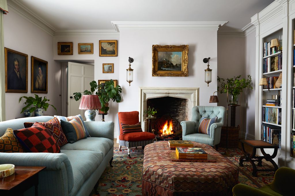 Upholstered in Prelles ‘Toile Barbare in ciel the ‘Talbot sofa from Howe London is a foil for Howes ‘Mark slipper chair...