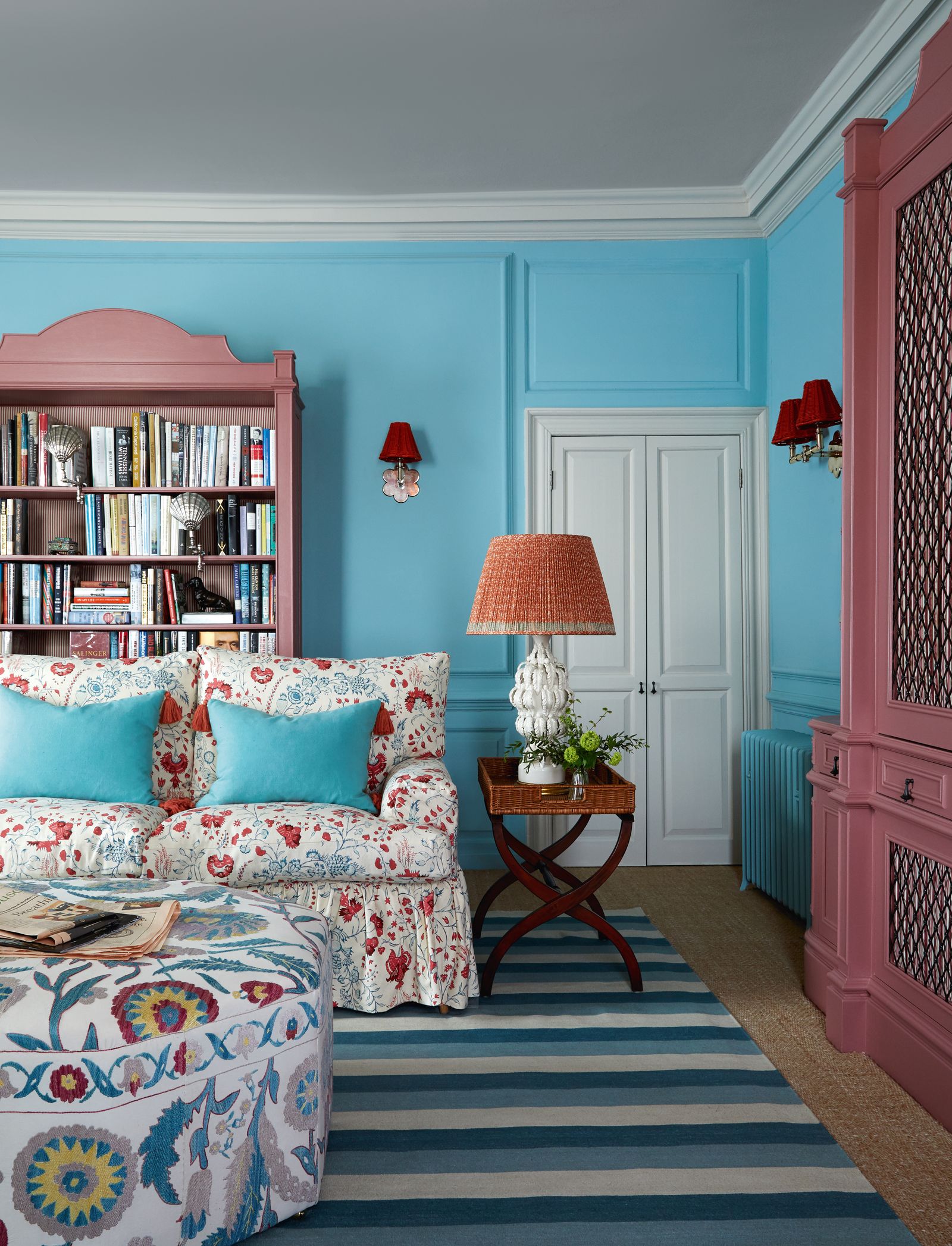 In the wife's sitting room a sofa in Soanes ‘Dianthus Chintz picks up on walls in Paint amp Paper Librarys ‘Constantia...